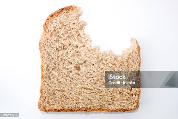 Bitten Slice Stock Photo - Download Image Now - Bread, Slice of Food, Missing Bite