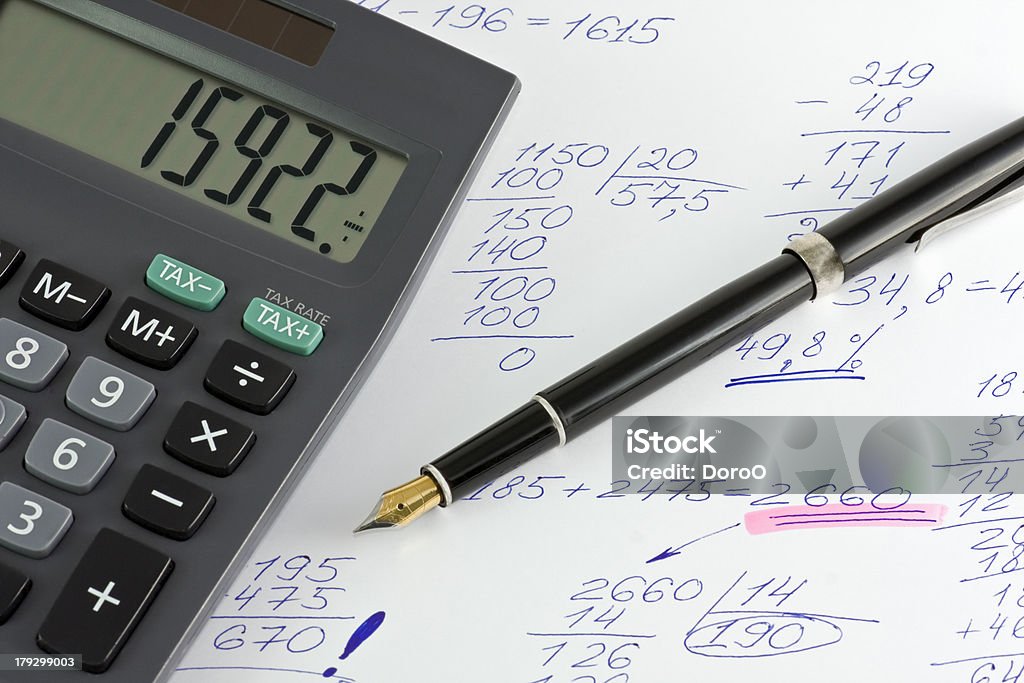 calculation "calculator, pen to calculate the numbers" Abstract Stock Photo