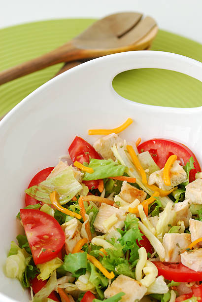 istock mixed salad with chicken and cheese 179299154