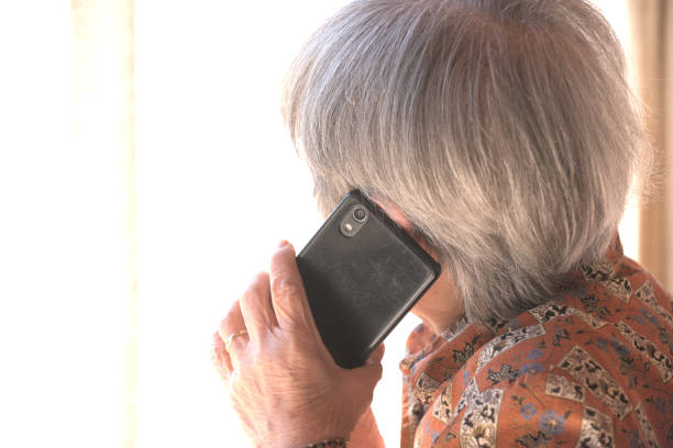istock elderly woman talking on mobile phone 1792991983