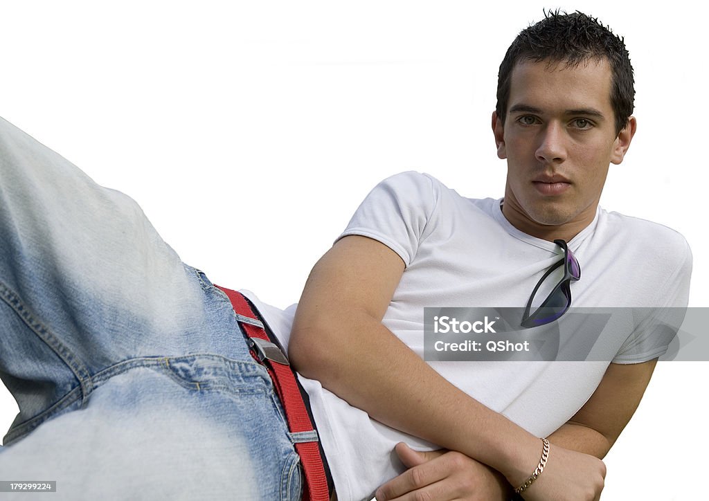Casual Young adult male in casual laid back position. Hair Gel Stock Photo