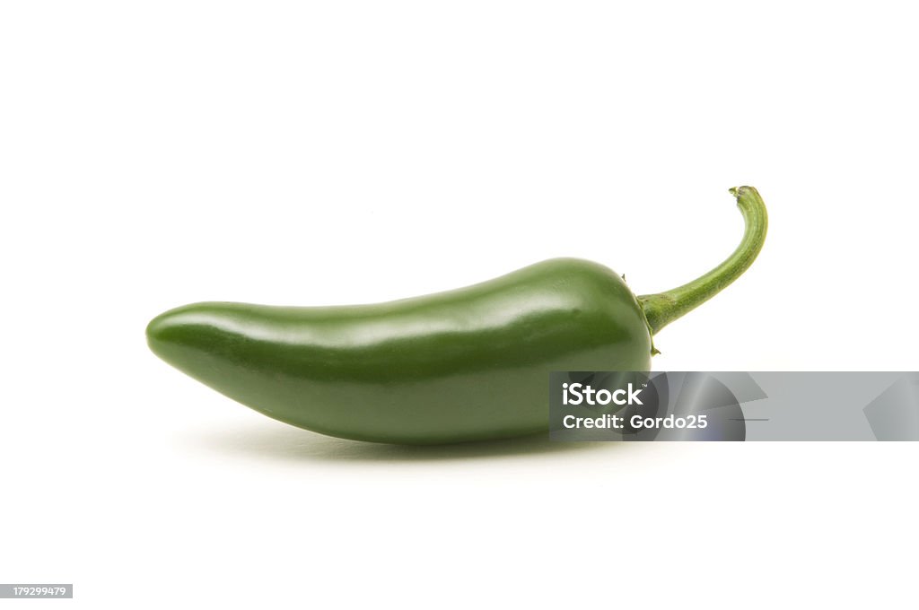 Portrait of a full Jalapeձno pepper Single jalapeno pepper isolated on white background Green Chili Pepper Stock Photo