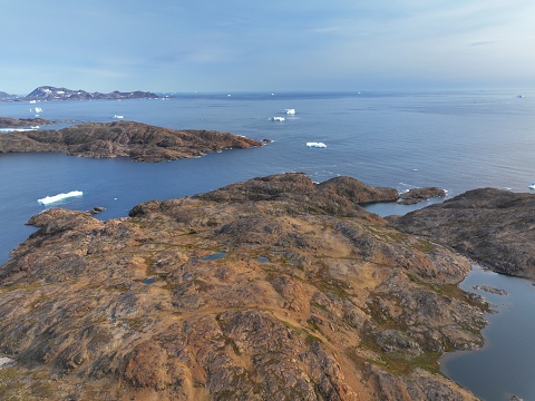 aerial view of arctic ocean and mountains in south east of Greenland