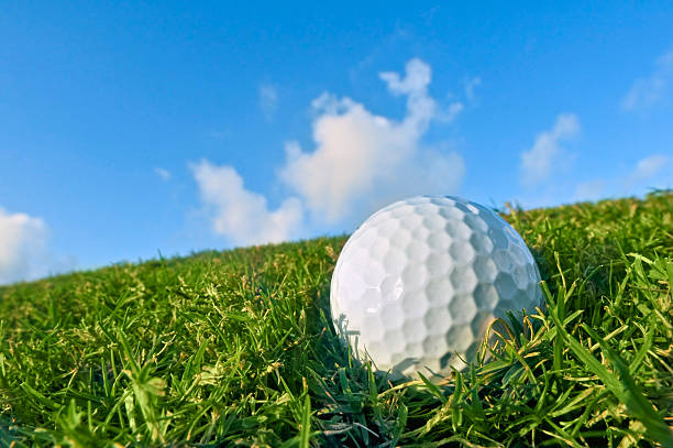 istock golf ball on fairway bunker with blue sky background 179300294
