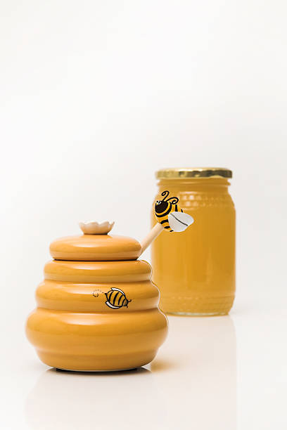 istock Honey pot and Jar in the background 179300759