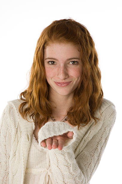 istock Redheaded Girl Holding Out Hand 179300974