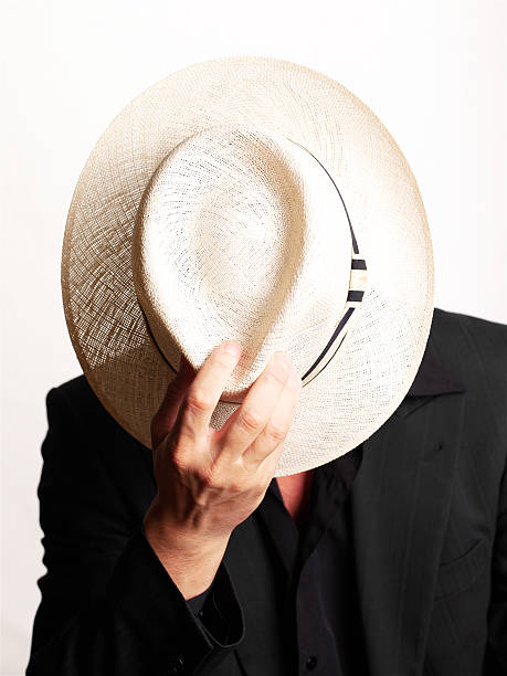 man with straw hat stock photo