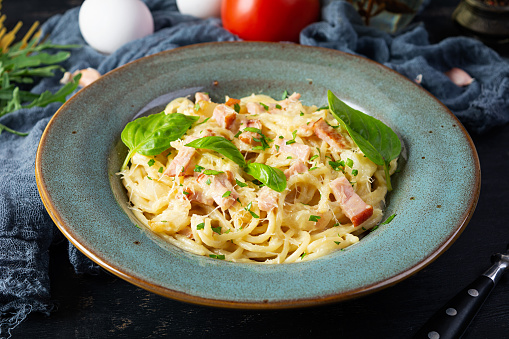 Pasta carbonara. Spaghetti with cheese, bacon, egg and cream sauce. Traditional italian cuisine