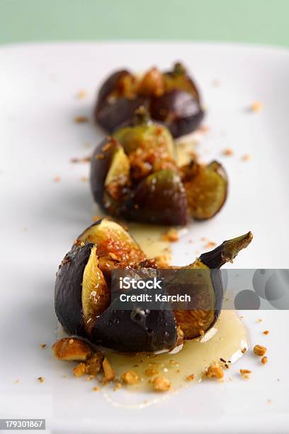 Roasted Figs In Mascarpone Cheese Honey And Hazelnuts Stock Photo - Download Image Now