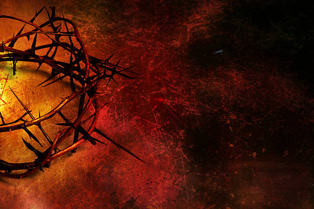 Crown of thorns on deep red grunge background
