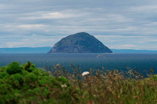 ailsa craig island scotland "ailsa craig scotland - view form balentrae, mull of kintyre and isle of arran in background" ayrshire cattle photos stock pictures, royalty-free photos & images