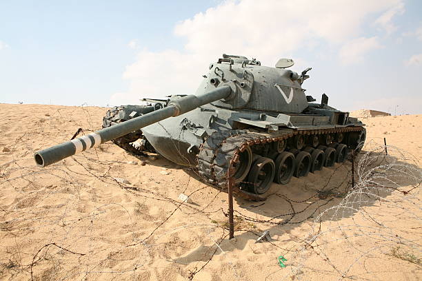 istock Israel army tank surrounded by barb wire 179302479