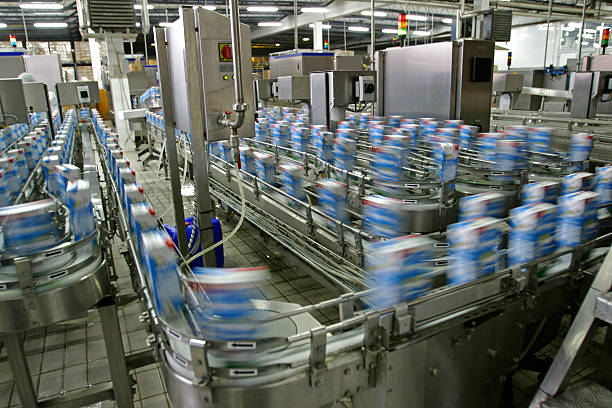 Production line Automated production line in modern dairy factory production line stock pictures, royalty-free photos & images