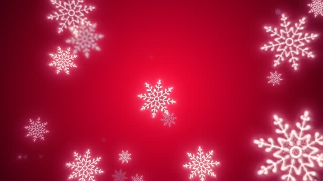 Christmas festive bright New Year background made of white glowing winter beautiful falling flying snowflakes patterns on a red background