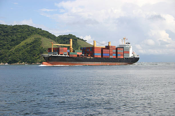 Cargo ship arriving stock photo