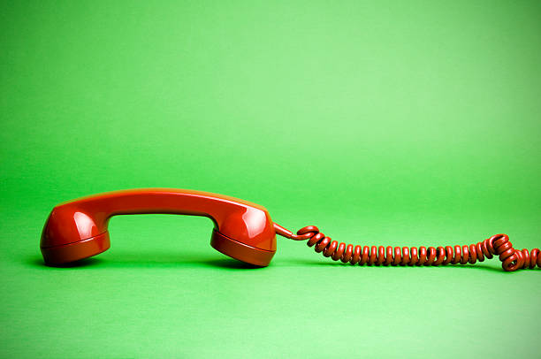 istock Red Telephone on Green 179303121