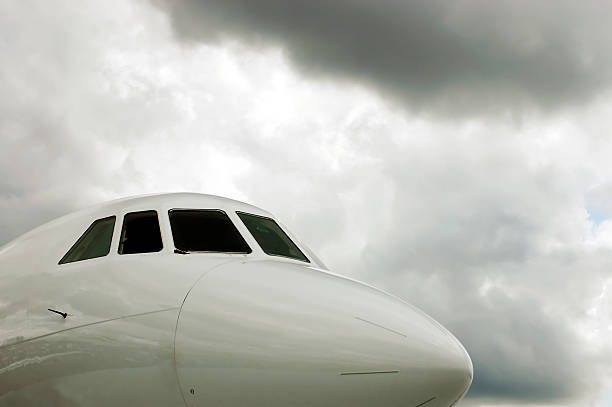 istock White Jet Cockpit and stormy skies 179303718