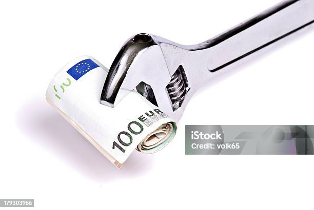 Squeezing Euro Stock Photo - Download Image Now - Adjustable Wrench, Business, Concepts