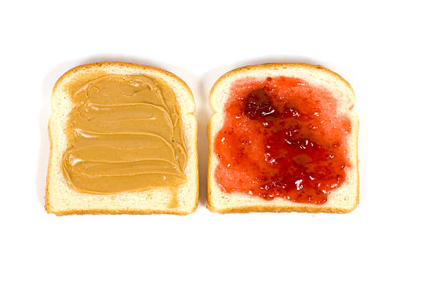 istock The Peanut Butter and Jam spread on to the bread slices 179304501