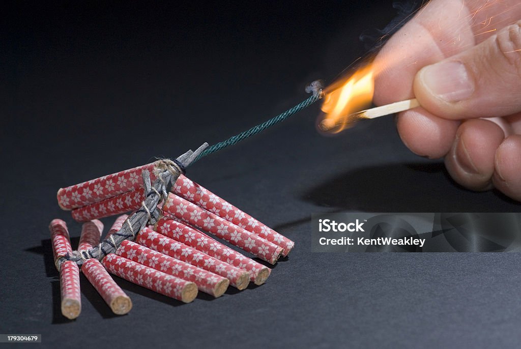 Fireworks lit with flame of match 02 Fireworks lit with flame of match Firework - Explosive Material Stock Photo