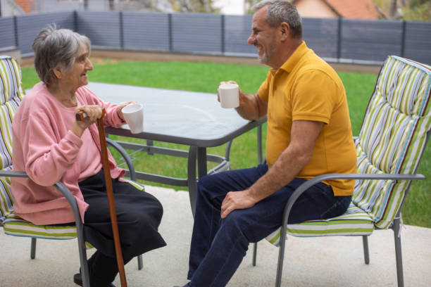 istock An old woman in a nursing home with her son 1793055866