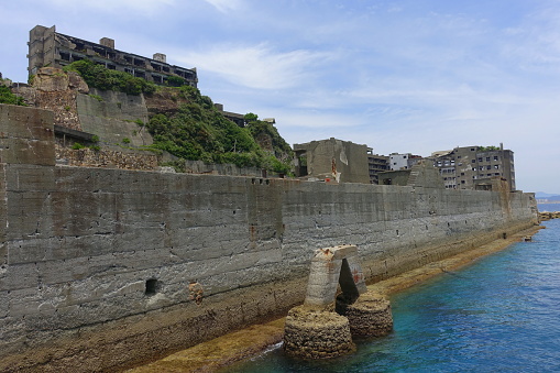 Nagasaki, Japan, May 28, 2022; An island that flourished as a coal mining island during Japan's Meiji period, but is now a ruined island.