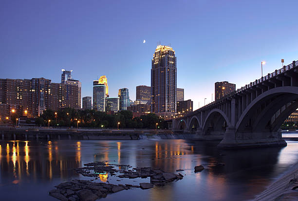 istock Downtown Minneapolis Minnesota and Partial Moon 179306565