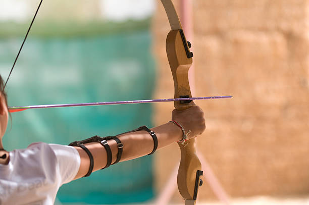 istock Person Drawing Back a Bow and Arrow 179306724
