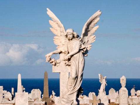 Victorian marble angel in cemetery beside the Tasman Sea in Sydney