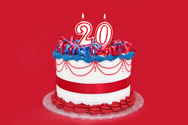 20th Cake "20th cake with numeral candles, on vibrant red background.  Please see the series." 20 24 years stock pictures, royalty-free photos & images
