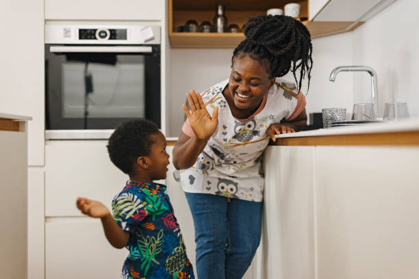 istock Mother and son high five 1793071267