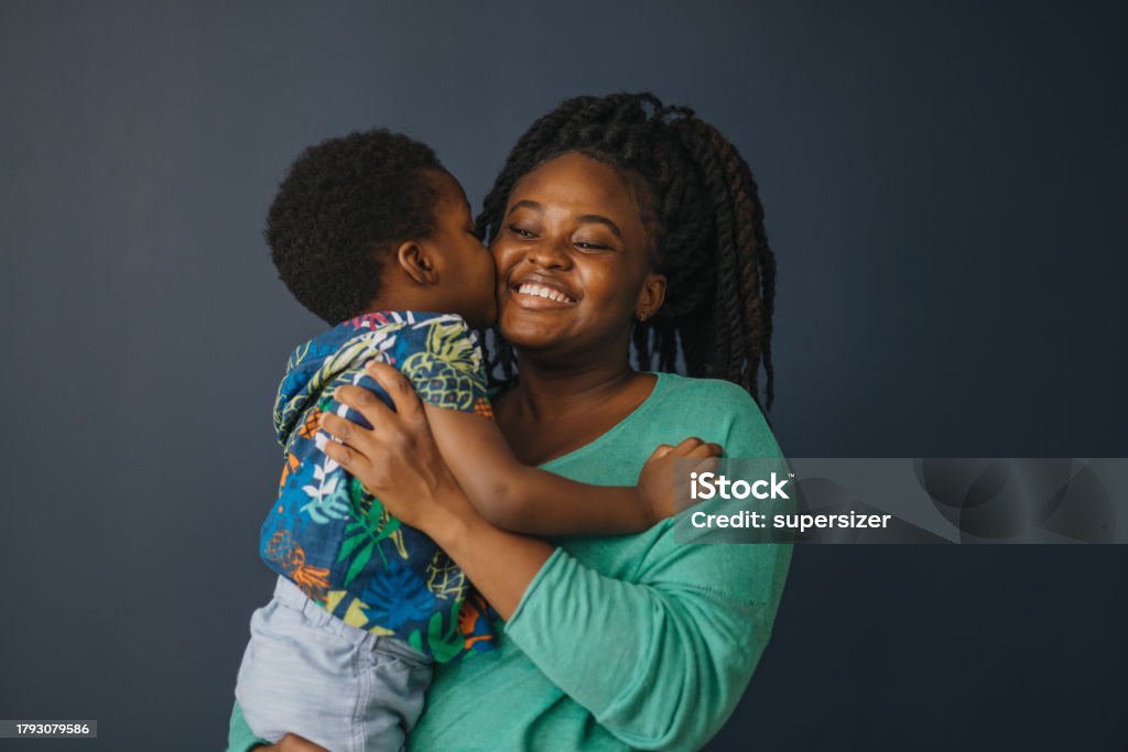 You are  my fav Mother and son portrait - son kissing mother Baby - Human Age Stock Photo