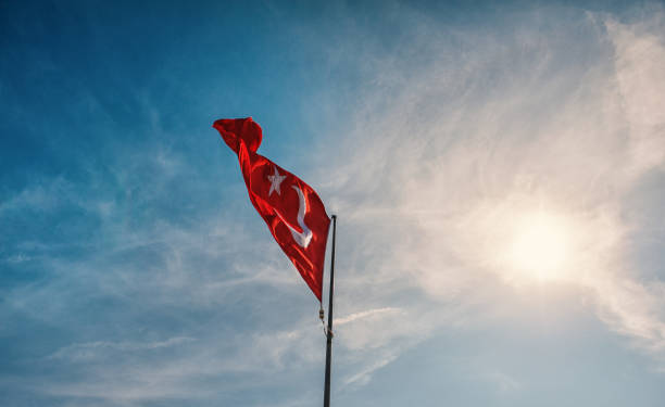 istock Red Turkish flag against blue sky 1793083832