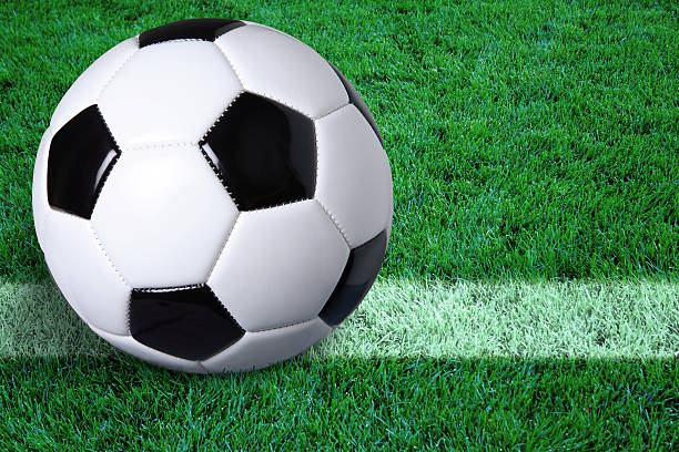 istock Soccer ball at midfield stripe 179309550