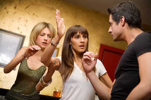 girls night out girls night out: horny guy fighting with his girlfriend vex nightclub stock pictures, royalty-free photos & images