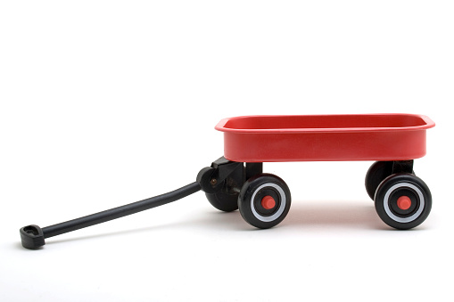 Toy red wagon on a white background
