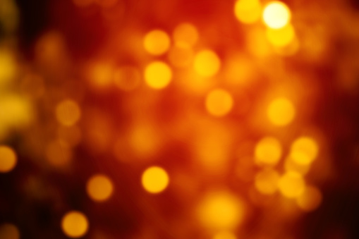 Red Christmas Background with Bokeh and Golden  lights. Xmas wallpaper