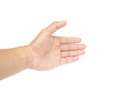 Male hands extended forward to shake hands or grab something on white background business concept.