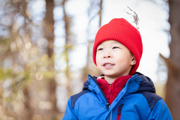Window of Curiosity: Inquisitive Boy Peeks Through and Explores the World Beyond