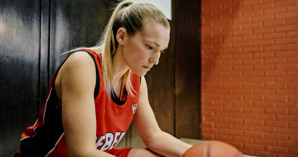 istock Woman sitting on court 1793136471