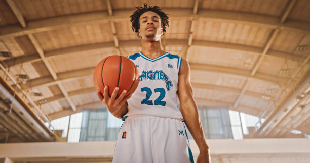 istock Basketball player standing on court 1793136524