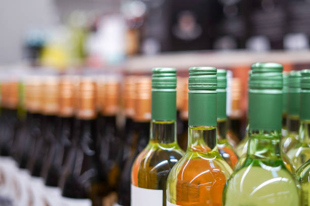istock Different wine bottles close up in the store, white and red wine 1793141339