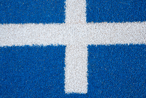 detail of the marking of the paddle tennis court and blue ground color. Pádel. H