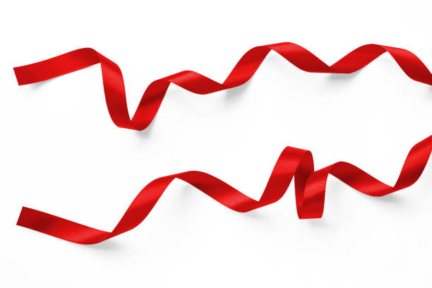 istock Red satin bow ribbon scroll set isolated on white background with clipping path for Christmas holiday and wedding anniversary card confetti design decoration 1793149399