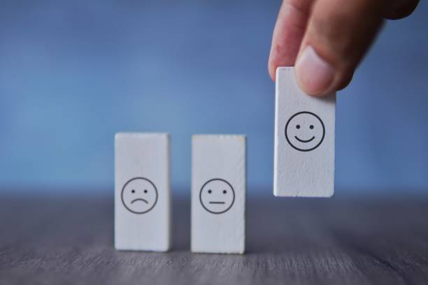 istock Closeup image of hand pick smile icon. 1793160137