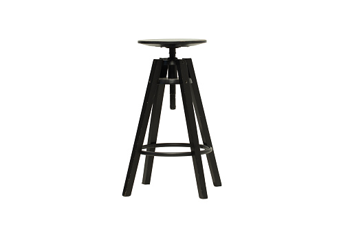 Studio shot of classic black tall wooden barstool standing on white.Black studio chair stool for photo shoots
