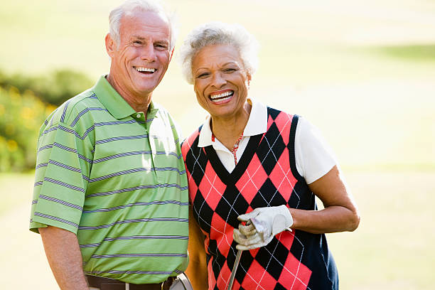 istock Couple Enjoying A Game Of Golf 179318324