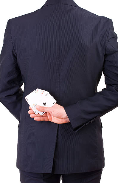 istock Businessman holding playing cards behind his back. 179318640