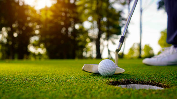 istock Blurred golfer playing golf in the evening golf course, on sun set evening time. 1793190806