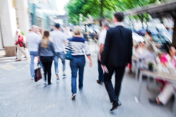 istock crowds of people on the sidewalk 179319600